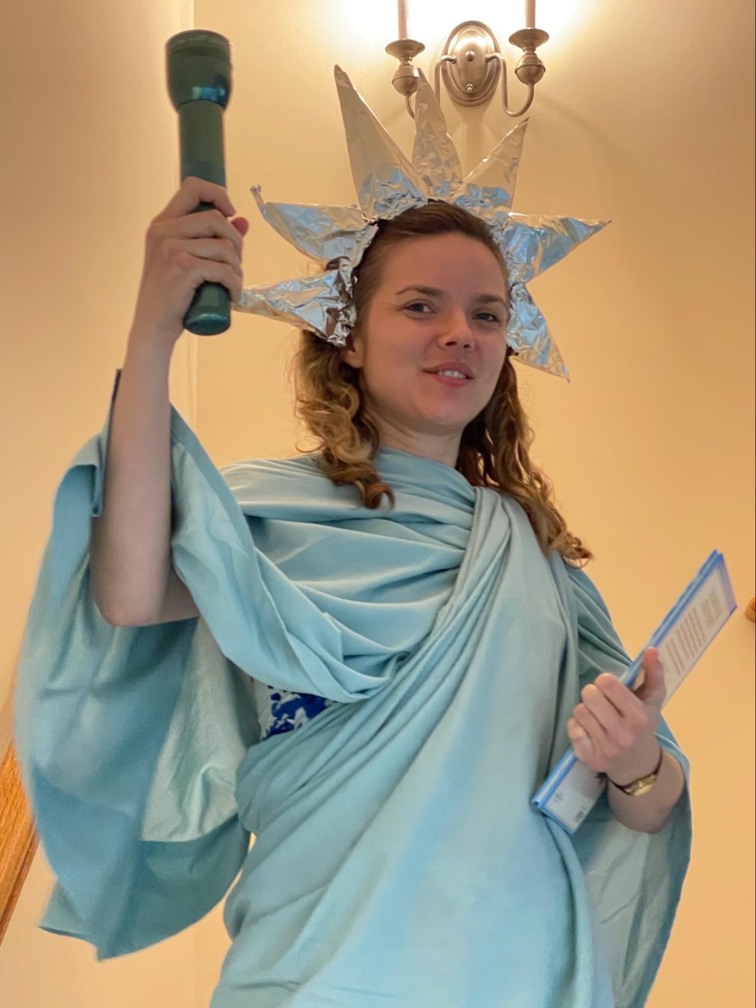 Adult dressed as Statue of Liberty