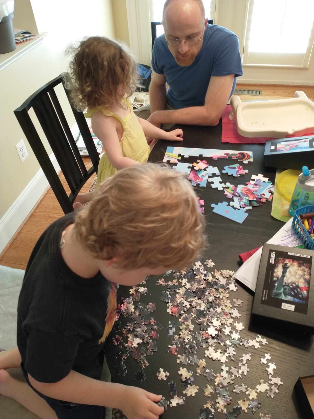 Children working on Statue of Liberty puzzles