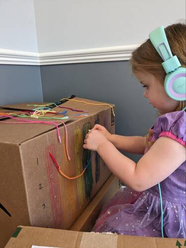 Picture of young girl at homemade switchboard